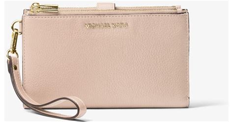 michael kors adele leather smartphone wristlet soft pink|Michael Kors double zip wallet.